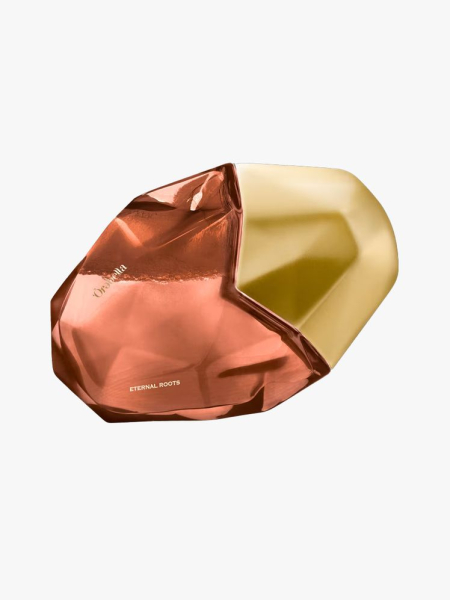 Orebella Eternal Roots Parfum in branded component on a light gray background